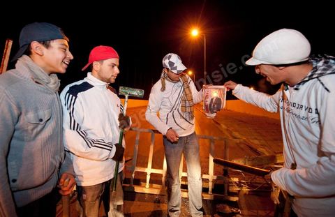 After the 6 p.m. curfew: Roadblocks and patrols set up by citizens in collaboration with the armed forces in every neighborhood of Tunis. Here in the working-class neighborhoods of Megrine Chaker in the southern suburbs of Tunis