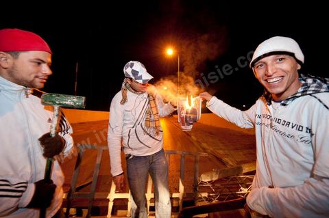 After the 6 p.m. curfew: Roadblocks and patrols set up by citizens in collaboration with the armed forces in every neighborhood of Tunis. Here in the working-class neighborhoods of Megrine Chaker in the southern suburbs of Tunis