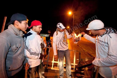 After the 6 p.m. curfew: Roadblocks and patrols set up by citizens in collaboration with the armed forces in every neighborhood of Tunis. Here in the working-class neighborhoods of Megrine Chaker in the southern suburbs of Tunis