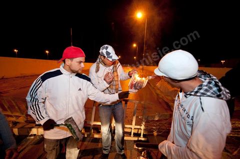 After the 6 p.m. curfew: Roadblocks and patrols set up by citizens in collaboration with the armed forces in every neighborhood of Tunis. Here in the working-class neighborhoods of Megrine Chaker in the southern suburbs of Tunis