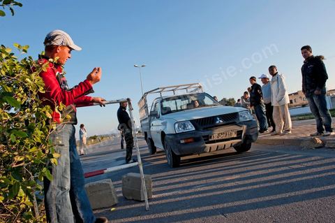 The people remain vigilant and are protecting themselves. Checkpoints and surveillance measures have been set up by citizens in collaboration with the armed forces in every neighborhood of Tunis. Here in the working-class neighborhoods of Megrine Chaker in the southern suburbs of Tunis