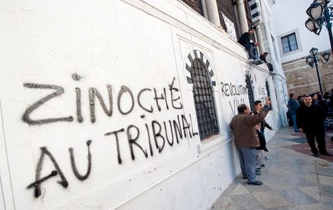 January 21, 2011: A message written by a lawyer on the walls of the Prime Minister’s Office during the demonstration at Kasbah Square in front of the gates of the Prime Minister’s Office, the people, united as one, are demanding the resignation of Prime Minister Ghanouchi. This demonstration saw a spontaneous movement among police officers, some of whom decided to join the people in protesting while apologizing for all their actions during Ben Ali’s police state.