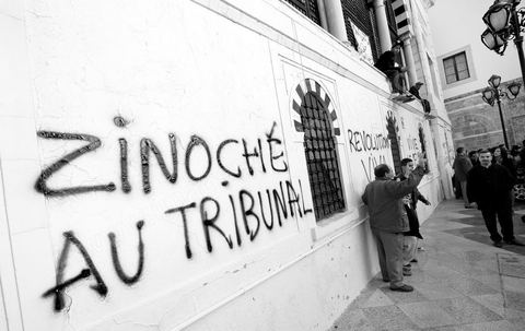 January 21, 2011: A message written by a lawyer on the walls of the Prime Minister’s Office during the demonstration at Kasbah Square in front of the gates of the Prime Minister’s Office, the people, united as one, are demanding the resignation of Prime Minister Ghanouchi. This demonstration saw a spontaneous movement among police officers, some of whom decided to join the people in protesting while apologizing for all their actions during Ben Ali’s police state.
