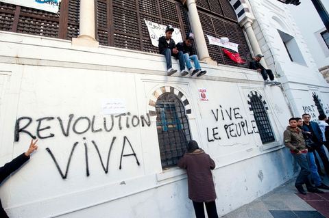 January 21, 2011: A message written by a lawyer on the walls of the Prime Minister’s Office during the demonstration at Kasbah Square in front of the gates of the Prime Minister’s Office, the people, united as one, are demanding the resignation of Prime Minister Ghanouchi. This demonstration saw a spontaneous movement among police officers, some of whom decided to join the people in protesting while apologizing for all their actions during Ben Ali’s police state.