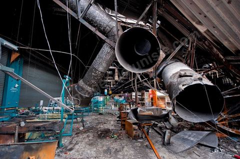 February 8: The interior of the Géant hypermarket and its aisles were completely burned, and part of the ceiling collapsed. The Tunis City shopping center and the Géant hypermarket in Tunis. After being looted, destroyed, and burned on the night of January 14, cleanup and reconstruction efforts have begun; 10 months of work and reconstruction are expected before it reopens.