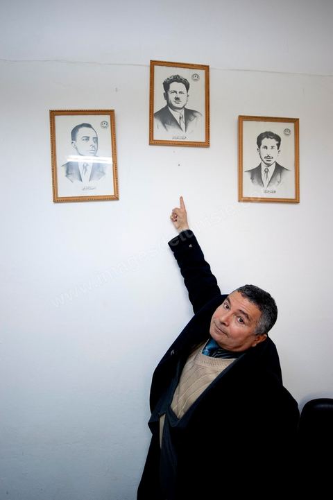 March 12, 2011: A member of the UGGT shows us, in his office, historical portraits of the great Tunisian labor leaders: the pioneer of the Tunisian labor movement: Mr. Ali El Hammi (on the right), the founder, Mr. Farhat Hached (in the center), and the great resistance fighter and historic general secretary, Mr. Ahmed Tlili (on the left). At the heart of the UGTT (Tunisian General Labor Union), its historic headquarters on Mohamed Ali Square in Tunis.
