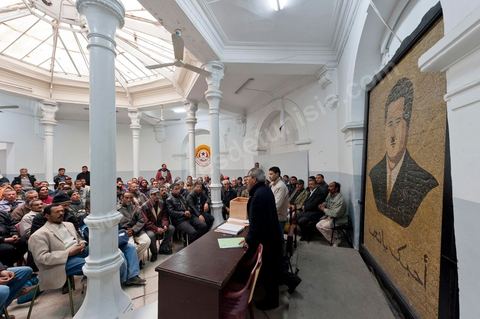 March 12, 2011: In the Rotonde’s main hall, under the watchful eye of Farhat Hached (a giant portrait) at the UGTT headquarters, a meeting of union members from a private construction company, SBF, to establish the SBF shop-floor union and elect union representatives through a vote by UGTT/SBF members. The vote was supervised by the Tunis Regional Office, chaired here by Mr. Amor Bouderbala, a member of the UGGT Tunis Executive Board. Seventeen UGTT/SBF union representatives are running for seven elected positions. At the heart of the UGTT (Tunisian General Labor Union), at its historic headquarters on Mohamed Ali Square in Tunis.