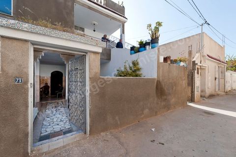 The Bouazizi Family’s New Home

Forced to leave Sidi Bouzid, where the pressure had become too much for them, the Bouazizi family found refuge 260 kilometers away, in Tunis. Mohamed Bouazizi’s mother, the iconic figure of Tunisia’s popular uprising, his sisters, and his two youngest brothers live in a house with blue ceramic tiles—a three-room ground-floor apartment—in the working-class neighborhood of Bousalsa in La Marsa, on the northern outskirts of Tunis. Leila, the 24-year-old eldest sister, is enrolled in a work-study vocational program to become a quality control inspector in the textile industry;  Semia, 19, is preparing for her high school diploma, while Basma, 16, Karim, 14, and Zyed, 8, are still in school. Only the eldest brother, Salem, lives elsewhere, in Sfax. Singled out by some residents of Sidi Bouzid, who accuse her of receiving money from the government, the Bouazizi family produces the lease for their new home, which they plan to rent for six months, through August, at a cost of 360 dinars (180 euros). Soon, the mother promises, they will return to Sidi Bouzid.