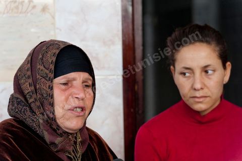 The Bouazizi Family’s New Home

Forced to leave Sidi Bouzid, where the pressure had become too much for them, the Bouazizi family found refuge 260 kilometers away, in Tunis. Mohamed Bouazizi’s mother, the iconic figure of Tunisia’s popular uprising, his sisters, and his two youngest brothers live in a house with blue ceramic tiles—a three-room ground-floor apartment—in the working-class neighborhood of Bousalsa in La Marsa, on the northern outskirts of Tunis. Leila, the 24-year-old eldest sister, is enrolled in a work-study vocational program to become a quality control inspector in the textile industry;  Semia, 19, is preparing for her high school diploma, while Basma, 16, Karim, 14, and Zyed, 8, are still in school. Only the eldest brother, Salem, lives elsewhere, in Sfax. Singled out by some residents of Sidi Bouzid, who accuse her of receiving money from the government, the Bouazizi family produces the lease for their new home, which they plan to rent for six months, through August, at a cost of 360 dinars (180 euros). Soon, the mother promises, they will return to Sidi Bouzid.