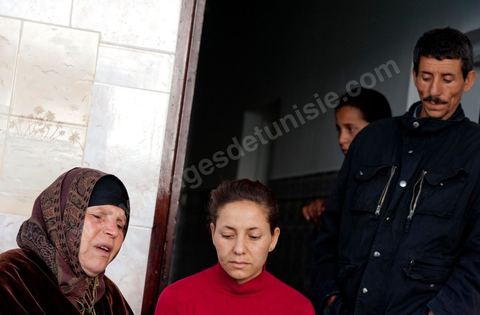 The Bouazizi Family’s New Home

Forced to leave Sidi Bouzid, where the pressure had become too much for them, the Bouazizi family found refuge 260 kilometers away, in Tunis. Mohamed Bouazizi’s mother, the iconic figure of Tunisia’s popular uprising, his sisters, and his two youngest brothers live in a house with blue ceramic tiles—a three-room ground-floor apartment—in the working-class neighborhood of Bousalsa in La Marsa, on the northern outskirts of Tunis. Leila, the 24-year-old eldest sister, is enrolled in a work-study vocational program to become a quality control inspector in the textile industry;  Semia, 19, is preparing for her high school diploma, while Basma, 16, Karim, 14, and Zyed, 8, are still in school. Only the eldest brother, Salem, lives elsewhere, in Sfax. Singled out by some residents of Sidi Bouzid, who accuse her of receiving money from the government, the Bouazizi family produces the lease for their new home, which they plan to rent for six months, through August, at a cost of 360 dinars (180 euros). Soon, the mother promises, they will return to Sidi Bouzid.