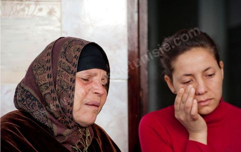 The Bouazizi Family’s New Home

Forced to leave Sidi Bouzid, where the pressure had become too much for them, the Bouazizi family found refuge 260 kilometers away, in Tunis. Mohamed Bouazizi’s mother, the iconic figure of Tunisia’s popular uprising, his sisters, and his two youngest brothers live in a house with blue ceramic tiles—a three-room ground-floor apartment—in the working-class neighborhood of Bousalsa in La Marsa, on the northern outskirts of Tunis. Leila, the 24-year-old eldest sister, is enrolled in a work-study vocational program to become a quality control inspector in the textile industry;  Semia, 19, is preparing for her high school diploma, while Basma, 16, Karim, 14, and Zyed, 8, are still in school. Only the eldest brother, Salem, lives elsewhere, in Sfax. Singled out by some residents of Sidi Bouzid, who accuse her of receiving money from the government, the Bouazizi family produces the lease for their new home, which they plan to rent for six months, through August, at a cost of 360 dinars (180 euros). Soon, the mother promises, they will return to Sidi Bouzid.