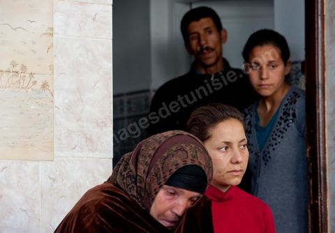 The Bouazizi Family’s New Home

Forced to leave Sidi Bouzid, where the pressure had become too much for them, the Bouazizi family found refuge 260 kilometers away, in Tunis. Mohamed Bouazizi’s mother, the iconic figure of Tunisia’s popular uprising, his sisters, and his two youngest brothers live in a house with blue ceramic tiles—a three-room ground-floor apartment—in the working-class neighborhood of Bousalsa in La Marsa, on the northern outskirts of Tunis. Leila, the 24-year-old eldest sister, is enrolled in a work-study vocational program to become a quality control inspector in the textile industry;  Semia, 19, is preparing for her high school diploma, while Basma, 16, Karim, 14, and Zyed, 8, are still in school. Only the eldest brother, Salem, lives elsewhere, in Sfax. Singled out by some residents of Sidi Bouzid, who accuse her of receiving money from the government, the Bouazizi family produces the lease for their new home, which they plan to rent for six months, through August, at a cost of 360 dinars (180 euros). Soon, the mother promises, they will return to Sidi Bouzid.