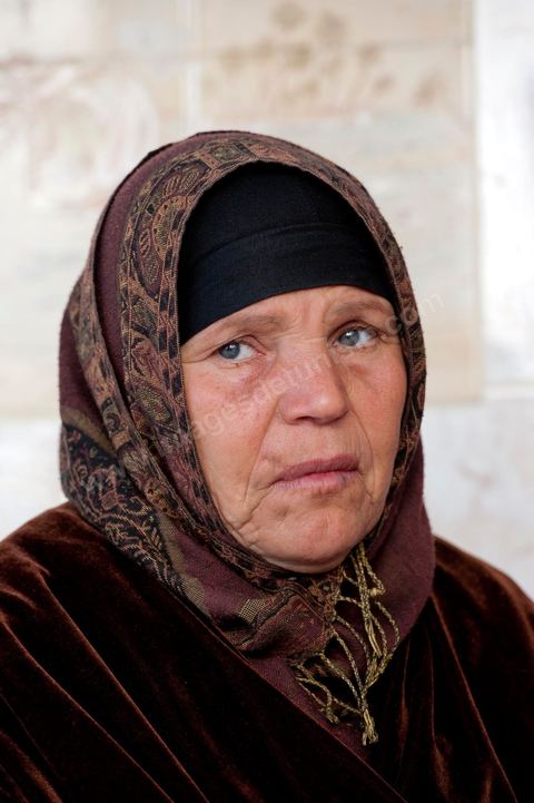 The Bouazizi Family’s New Home

Forced to leave Sidi Bouzid, where the pressure had become too much for them, the Bouazizi family found refuge 260 kilometers away, in Tunis. Mohamed Bouazizi’s mother, the iconic figure of Tunisia’s popular uprising, his sisters, and his two youngest brothers live in a house with blue ceramic tiles—a three-room ground-floor apartment—in the working-class neighborhood of Bousalsa in La Marsa, on the northern outskirts of Tunis. Leila, the 24-year-old eldest sister, is enrolled in a work-study vocational program to become a quality control inspector in the textile industry;  Semia, 19, is preparing for her high school diploma, while Basma, 16, Karim, 14, and Zyed, 8, are still in school. Only the eldest brother, Salem, lives elsewhere, in Sfax. Singled out by some residents of Sidi Bouzid, who accuse her of receiving money from the government, the Bouazizi family produces the lease for their new home, which they plan to rent for six months, through August, at a cost of 360 dinars (180 euros). Soon, the mother promises, they will return to Sidi Bouzid.