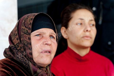 The Bouazizi Family’s New Home

Forced to leave Sidi Bouzid, where the pressure had become too much for them, the Bouazizi family found refuge 260 kilometers away, in Tunis. Mohamed Bouazizi’s mother, the iconic figure of Tunisia’s popular uprising, his sisters, and his two youngest brothers live in a house with blue ceramic tiles—a three-room ground-floor apartment—in the working-class neighborhood of Bousalsa in La Marsa, on the northern outskirts of Tunis. Leila, the 24-year-old eldest sister, is enrolled in a work-study vocational program to become a quality control inspector in the textile industry;  Semia, 19, is preparing for her high school diploma, while Basma, 16, Karim, 14, and Zyed, 8, are still in school. Only the eldest brother, Salem, lives elsewhere, in Sfax. Singled out by some residents of Sidi Bouzid, who accuse her of receiving money from the government, the Bouazizi family produces the lease for their new home, which they plan to rent for six months, through August, at a cost of 360 dinars (180 euros). Soon, the mother promises, they will return to Sidi Bouzid.