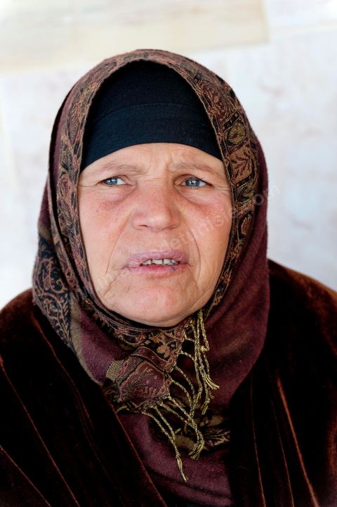 The Bouazizi Family’s New Home

Forced to leave Sidi Bouzid, where the pressure had become too much for them, the Bouazizi family found refuge 260 kilometers away, in Tunis. Mohamed Bouazizi’s mother, the iconic figure of Tunisia’s popular uprising, his sisters, and his two youngest brothers live in a house with blue ceramic tiles—a three-room ground-floor apartment—in the working-class neighborhood of Bousalsa in La Marsa, on the northern outskirts of Tunis. Leila, the 24-year-old eldest sister, is enrolled in a work-study vocational program to become a quality control inspector in the textile industry;  Semia, 19, is preparing for her high school diploma, while Basma, 16, Karim, 14, and Zyed, 8, are still in school. Only the eldest brother, Salem, lives elsewhere, in Sfax. Singled out by some residents of Sidi Bouzid, who accuse her of receiving money from the government, the Bouazizi family produces the lease for their new home, which they plan to rent for six months, through August, at a cost of 360 dinars (180 euros). Soon, the mother promises, they will return to Sidi Bouzid.
