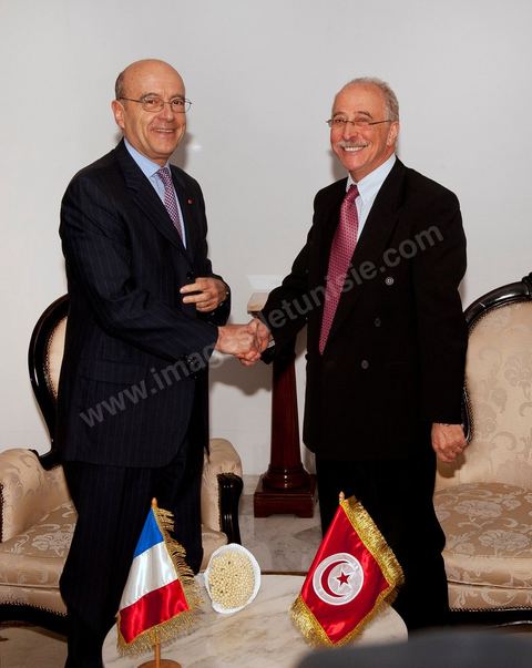 January 20, 2011: Upon arrival at the airport, Juppé was greeted by Mr. Mohamed Mouldi Kefi, his Tunisian counterpart, during the visit to Tunisia by Mr. Alain Juppé, French Minister of Foreign Affairs.