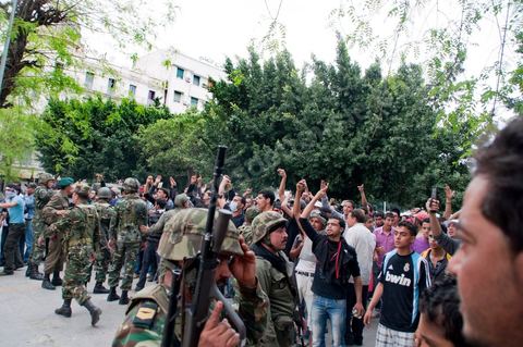 May 7, 2011: Clashes broke out between protesters and police near the main train station in Tunis, on Barcelona Square, with the army attempting to calm both sides. Police fired tear gas and warning shots at the protesters.