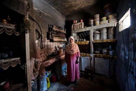 A woman from the Jeridian tribe in her burned-out home in the Tripolitain neighborhood during the clashes of June 3–5, 2011, in the city of Metlaoui