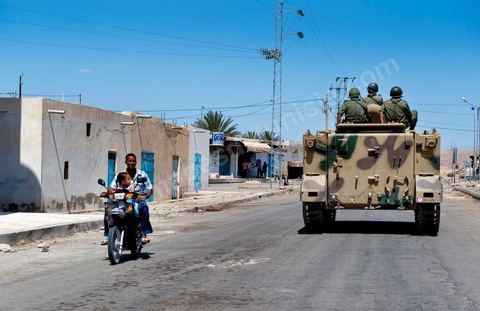 A military patrol along the railroad tracks separating the two tribes in Metlaoui during the clashes that took place from June 3 to 5, 2011, in the town of Metlaoui