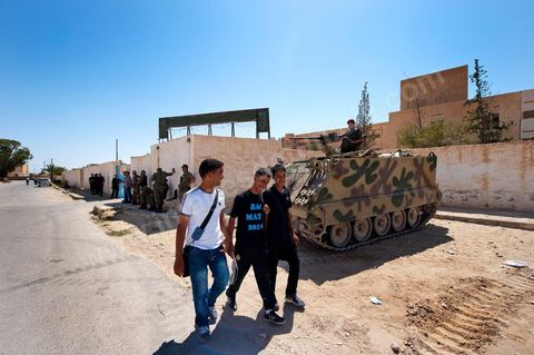 High school graduation ceremony in front of the Metlaoui High School, which was under military protection following the clashes that took place from June 3 to 5, 2011, in the city of Metlaoui