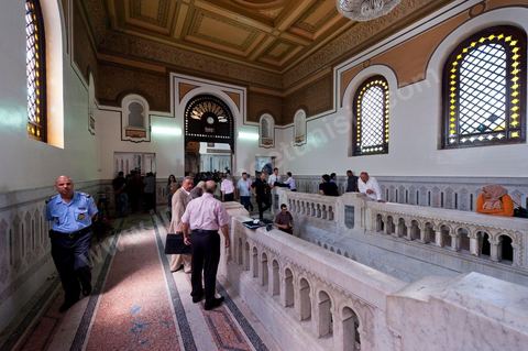20 juin 2011 : Tribunal de première Instance de Tunis, Chambre criminelle, la justice tunisienne a entamé aujourd’hui le procès de Benali et de sa femme en son absence, cette audience est la première parmi les 93 procédures engagées contre le président déchu, dont 35 relèvent de la justice militaire.Le procès d’aujourd’hui concerne l'affaire du palais de Sidi Dherif où une importante quantité de devises et des bijoux de valeur ont été saisis. Ben Ali est également accusé de  détention d'armes et de possession de stupéfiants, saisis au palais de Carthage.  Il est passible de peines allant de 5 à 20 ans de prison. 
