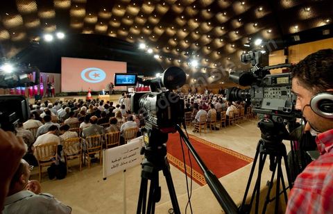 August 18: Address by the Tunisian interim Prime Minister, Mr. Béji Caïd Essebsi, at the Tunis Convention Center. Tunisian Prime Minister Béji Caïd Essebsi assured the nation on Thursday that his government was doing “the impossible” to successfully complete the transition and lead the country to elections, in a speech to the nation delivered at the Tunis Convention Center.“We have done the impossible,” Mr. Caïd Essebsi declared in a 40-minute speech—delivered in the form of a plea—before some 250 political figures and representatives of civil society.“The government is fulfilling its responsibilities despite the difficulties,” added the Prime Minister, referring to a “very difficult” economic and social situation and affirming that he hears “the people’s demands.”“Our fundamental goal is to hold the Constituent Assembly election on October 23 and to organize a free and transparent vote. If we do not succeed, our government will have failed, and the revolution will have failed,” declared the prime minister, who faces growing opposition.Mr. Caïd Essebsi’s transitional government has been leading the country since late February, following the fall of President Zine el Abidine Ben Ali’s regime, which was ousted from power on January 14 by a popular uprising.