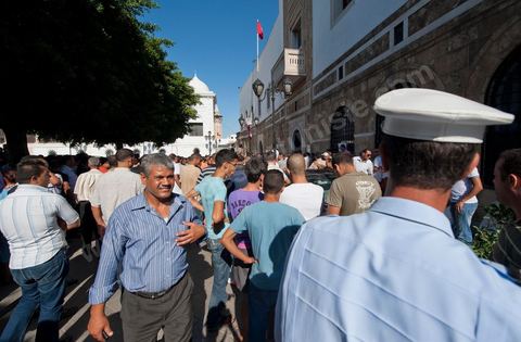 September 6, 2011: At Kasbah Square, police officers protested and occupied Government Square for a demonstration and sit-in. The police officers even entered the Prime Minister’s Office, demanding that the interim Prime Minister, Mr. Béji Caïd Essebsi, apologize for remarks he made that morning during his press conference, in which he called for the dissolution of law enforcement unions. In an address to the Tunisian people, the prime minister announced, to that end, a series of security measures, particularly the strict enforcement of the state of emergency in effect since the January 14 revolution.The government, he said, “will no longer tolerate practices that risk paralyzing the daily lives of Tunisians, such as blocking roads, attacking police stations and government facilities in the regions, and assaulting the national security forces and the army.”In this context, the Prime Minister announced the suspension of all union activities by the security forces and the dissolution of their union. He expressed surprise at the content of the statement released by the Union of Internal Security Forces, which, he noted, contained “insinuations of rebellion.”