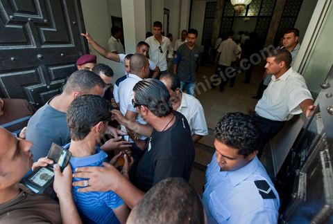 September 6, 2011: At Kasbah Square, police officers protested and occupied Government Square for a demonstration and sit-in. The police officers even entered the Prime Minister’s Office, demanding that the interim Prime Minister, Mr. Béji Caïd Essebsi, apologize for remarks he made that morning during his press conference, in which he called for the dissolution of law enforcement unions. In an address to the Tunisian people, the prime minister announced, to that end, a series of security measures, particularly the strict enforcement of the state of emergency in effect since the January 14 revolution.The government, he said, “will no longer tolerate practices that risk paralyzing the daily lives of Tunisians, such as blocking roads, attacking police stations and government facilities in the regions, and assaulting the national security forces and the army.”In this context, the Prime Minister announced the suspension of all union activities by the security forces and the dissolution of their union. He expressed surprise at the content of the statement released by the Union of Internal Security Forces, which, he noted, contained “insinuations of rebellion.”