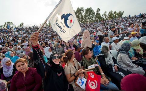 October 1, 2011, in Sidi Bouzid: A large rally organized by the Ennahdha Party to mark the first day of the campaign for the Constituent Assembly election on October 23. The Islamist Ennahdha Party chose Sidi Bouzid—the symbolic city of the revolution—as the site for its first campaign rally, attended by party leader Rached Ghannouchi, members of the party’s Executive Bureau, and several candidates from various regions across the country.