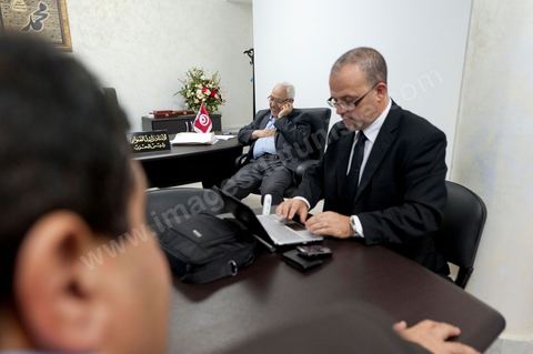 A few party members and candidates are accompanying Rached Ghannouchi. In the office of Rached Ghannouchi, president and founder of Ennahda, during the election night results at Ennahda’s party headquarters in Tunis. 