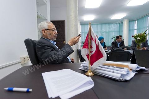 A few party members and candidates are accompanying Rached Ghannouchi. In the office of Rached Ghannouchi, president and founder of Ennahda, during the election night results at Ennahda’s party headquarters in Tunis. 