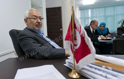A few party members and candidates are accompanying Rached Ghannouchi. In the office of Rached Ghannouchi, president and founder of Ennahda, during the election night results at Ennahda’s party headquarters in Tunis. 