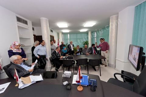 A few party members and candidates are accompanying Rached Ghannouchi. In the office of Rached Ghannouchi, president and founder of Ennahda, during the election night results at Ennahda’s party headquarters in Tunis. 