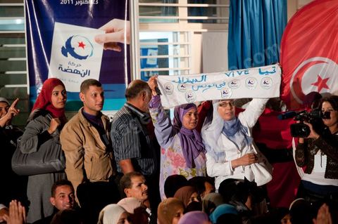 A crowd gathers in front of the Ennahdha party headquarters on election night.