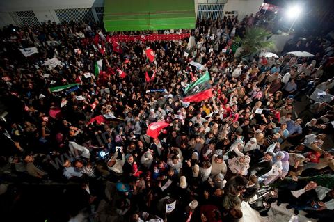 A crowd gathers in front of the Ennahdha party headquarters on election night.