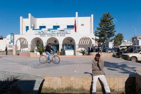 Scenes from the streets of Sidi Bouzid, clothing stores, and markets