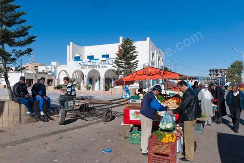 Scenes from the streets of Sidi Bouzid, clothing stores, and markets