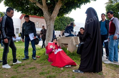 March 14, 2012: A group of women wearing niqabs at the University of Manouba, on the eve of the elections for student representatives to the academic committees, Dean Habib Kazdaghli organized a ceremony in one of the lecture halls in honor of the young student Khaoula Rachidi, who intervened when a Salafist attempted to remove the Tunisian flag last week. 