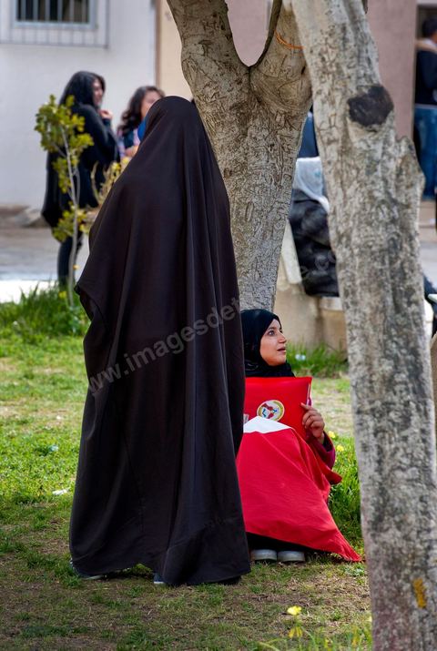 March 14, 2012: A group of women wearing niqabs at the University of Manouba, on the eve of the elections for student representatives to the academic committees, Dean Habib Kazdaghli organized a ceremony in one of the lecture halls in honor of the young student Khaoula Rachidi, who intervened when a Salafist attempted to remove the Tunisian flag last week. 