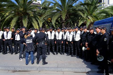 May 1, 2012, on Habib Bourguiba Avenue: Tunisian union members and workers demonstrated on the avenue to mark Labor Day. Police briefing ahead of the major day of protests.
