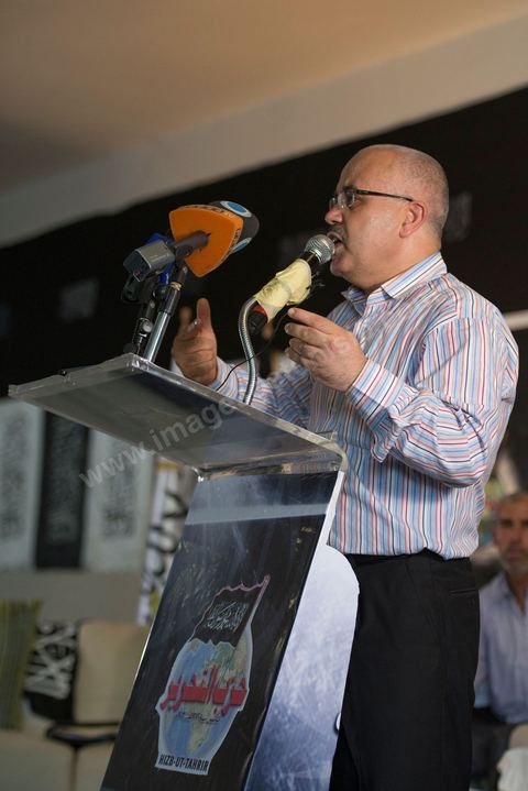 Ridha Belhadj, porte parole du Hizb ut Tahrir (parti de la liberation)  lors du Meeting, dimanche 24 juin au parc des expositions à la Soukra (banlieue de Tunis). Le Hizb ut Tahrir, un parti internationaliste, partisan de la restauration du califat. Pour l'instant, le parti n'est pas autorisé en Tunisie en raison de sa référence à la religion.