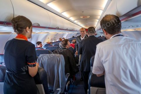 July 17: On the plane, the president greets the members of the delegation accompanying him on the first day of the official visit to Paris and Marseille by Moncef Marzouki, President of the Republic of Tunisia