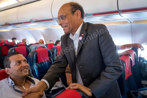 July 17: On the plane, the president greets the members of the delegation accompanying him on the first day of the official visit to Paris and Marseille by Moncef Marzouki, President of the Republic of Tunisia