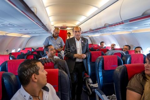 July 17: On the plane, the president greets the members of the delegation accompanying him on the first day of the official visit to Paris and Marseille by Moncef Marzouki, President of the Republic of Tunisia