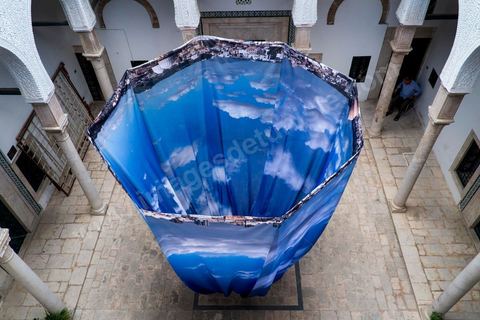26 septembre 2012 : "Mondes flottants" de Meriem Bouderbala est une installation photographique au coeur dans le patio du Dar Haddad dans le cadre de Dream City 2012, "l'artiste face aux libertés" dans la médina de Tunis du 26 au 30 septembre. Au delà de la simple organisation d'une manifestation en espace public, chaque édition de Dream City est le fruit d'une recherche collective menée entre artistes sélectionnées et spécialistes de l'art, de la ville et des sciences humaines.