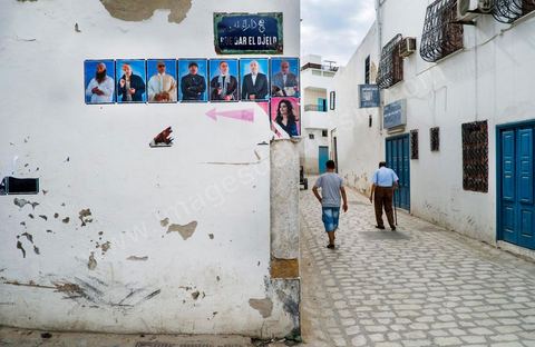 September 26, 2012: A random display of photographic portraits by Mouna Jemal and Wadi Mhiri on the walls of the medina as part of Dream City 2012, “The Artist and Freedom,” held in the medina of Tunis from September 26 to 30. Beyond simply organizing an event in a public space, each edition of Dream City is the result of a collective research effort carried out by selected artists and specialists in art, urban studies, and the humanities.