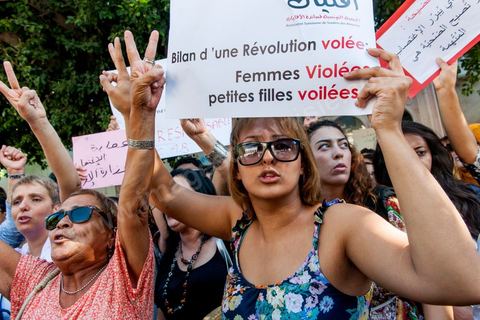 October 2, 2012: A rally organized by women’s and human rights groups took place in front of the Tunis courthouse in support of the Tunis couple who were summoned to appear before a judge this morning. The woman who was raped by police officers and her fiancé were questioned this morning by an investigating judge in Tunis, who must decide whether or not to charge her with “indecent exposure.” Following a questioning session lasting more than two hours conducted by Mohamed Ben Meftah, the victim’s lawyers said they were “optimistic” that the charges against their client and her fiancé for this offense—which carries a sentence of up to six months in prison—would be dropped. The investigating judge must decide in the coming hours or days whether to “dismiss the case or refer it to the appropriate court.”