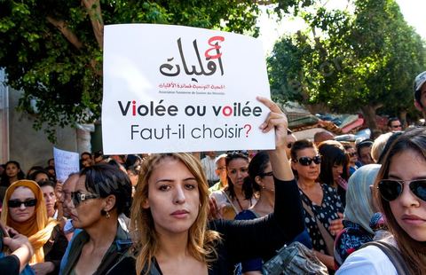 October 2, 2012: A rally organized by women’s and human rights groups took place in front of the Tunis courthouse in support of the Tunis couple who were summoned to appear before a judge this morning. The woman who was raped by police officers and her fiancé were questioned this morning by an investigating judge in Tunis, who must decide whether or not to charge her with “indecent exposure.” Following a questioning session lasting more than two hours conducted by Mohamed Ben Meftah, the victim’s lawyers said they were “optimistic” that the charges against their client and her fiancé for this offense—which carries a sentence of up to six months in prison—would be dropped. The investigating judge must decide in the coming hours or days whether to “dismiss the case or refer it to the appropriate court.”