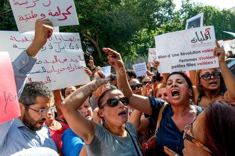 October 2, 2012: A rally organized by women’s and human rights groups took place in front of the Tunis courthouse in support of the Tunis couple who were summoned to appear before a judge this morning. The woman who was raped by police officers and her fiancé were questioned this morning by an investigating judge in Tunis, who must decide whether or not to charge her with “indecent exposure.” Following a questioning session lasting more than two hours conducted by Mohamed Ben Meftah, the victim’s lawyers said they were “optimistic” that the charges against their client and her fiancé for this offense—which carries a sentence of up to six months in prison—would be dropped. The investigating judge must decide in the coming hours or days whether to “dismiss the case or refer it to the appropriate court.”