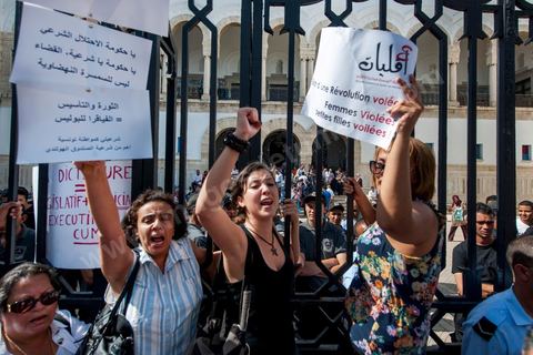 October 2, 2012: A rally organized by women’s and human rights groups took place in front of the Tunis courthouse in support of the Tunis couple who were summoned to appear before a judge this morning. The woman who was raped by police officers and her fiancé were questioned this morning by an investigating judge in Tunis, who must decide whether or not to charge her with “indecent exposure.” Following a questioning session lasting more than two hours conducted by Mohamed Ben Meftah, the victim’s lawyers said they were “optimistic” that the charges against their client and her fiancé for this offense—which carries a sentence of up to six months in prison—would be dropped. The investigating judge must decide in the coming hours or days whether to “dismiss the case or refer it to the appropriate court.”